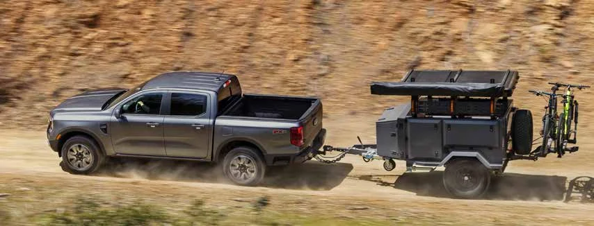 2026 Ford Ranger towing an off-road camping trailer