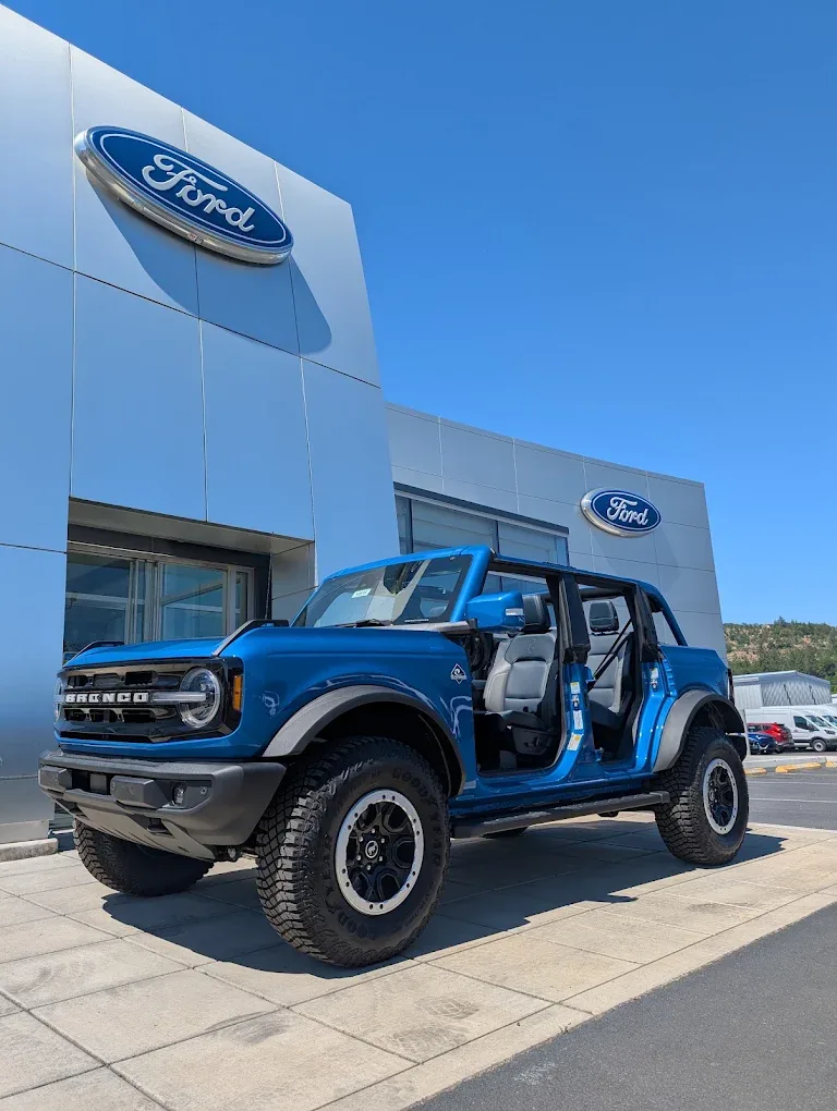 Blue Ford Bronco displayed outside Butler Ford